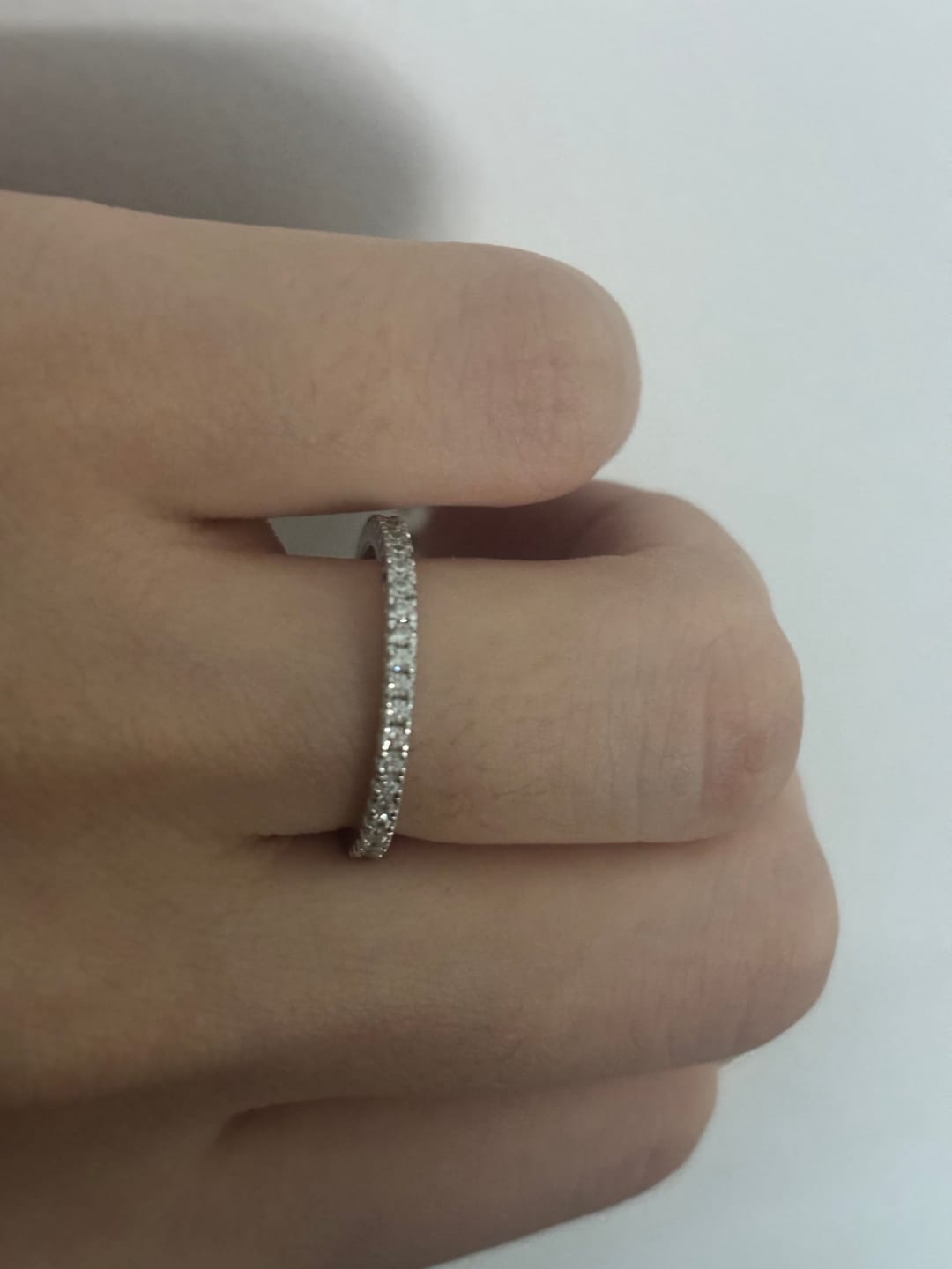 Customer photo review of S925 Moissanite 0.5 Ct Full Eternity Thin Wedding Band Travel Ring For Everyday Wear