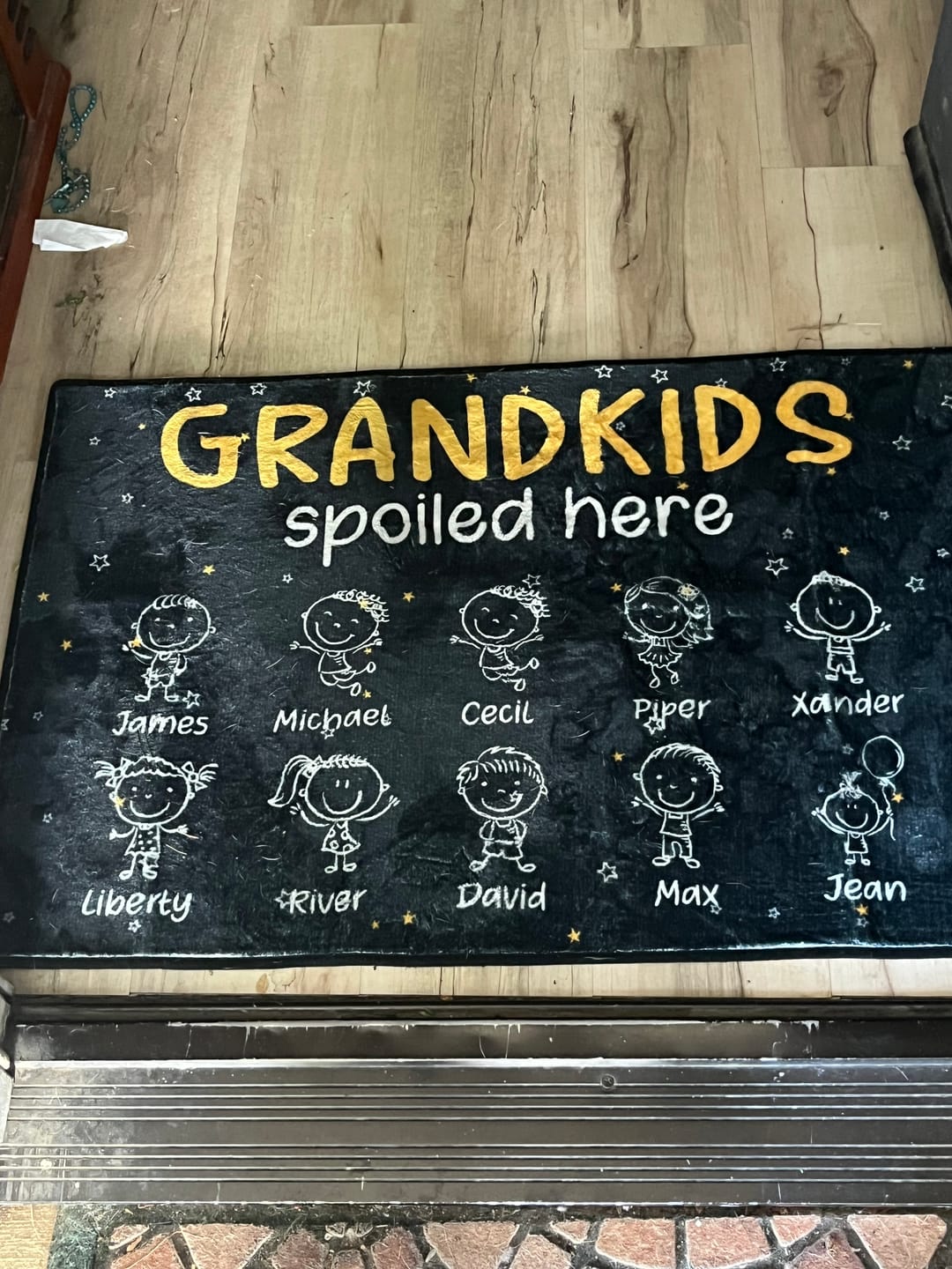Customer photo review of Grandkids Spoiled Here Doodle - Personalized Doormat