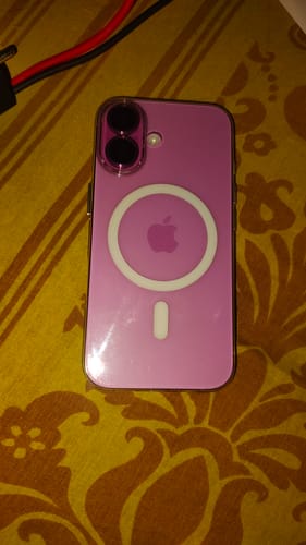 Customer's Anti Yellow Magsafe Clear Case on a pink iPhone, showing the white MagSafe ring.