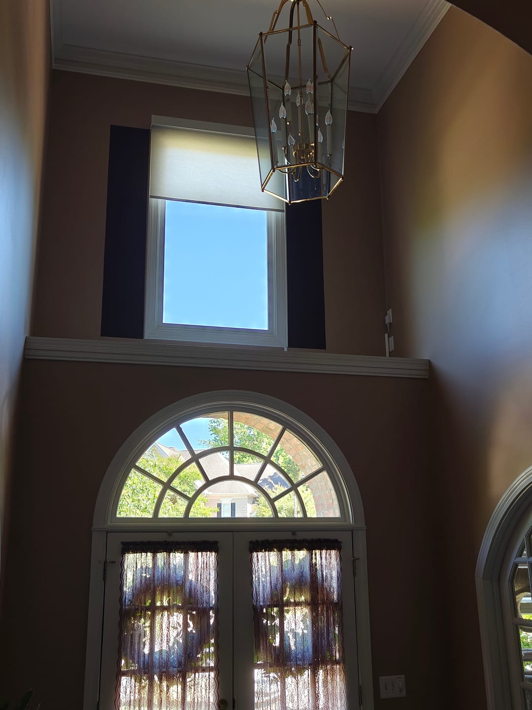 Customer photo review of SmartWings Motorized Light Filtering Roller Shades 70% Blackout Safari