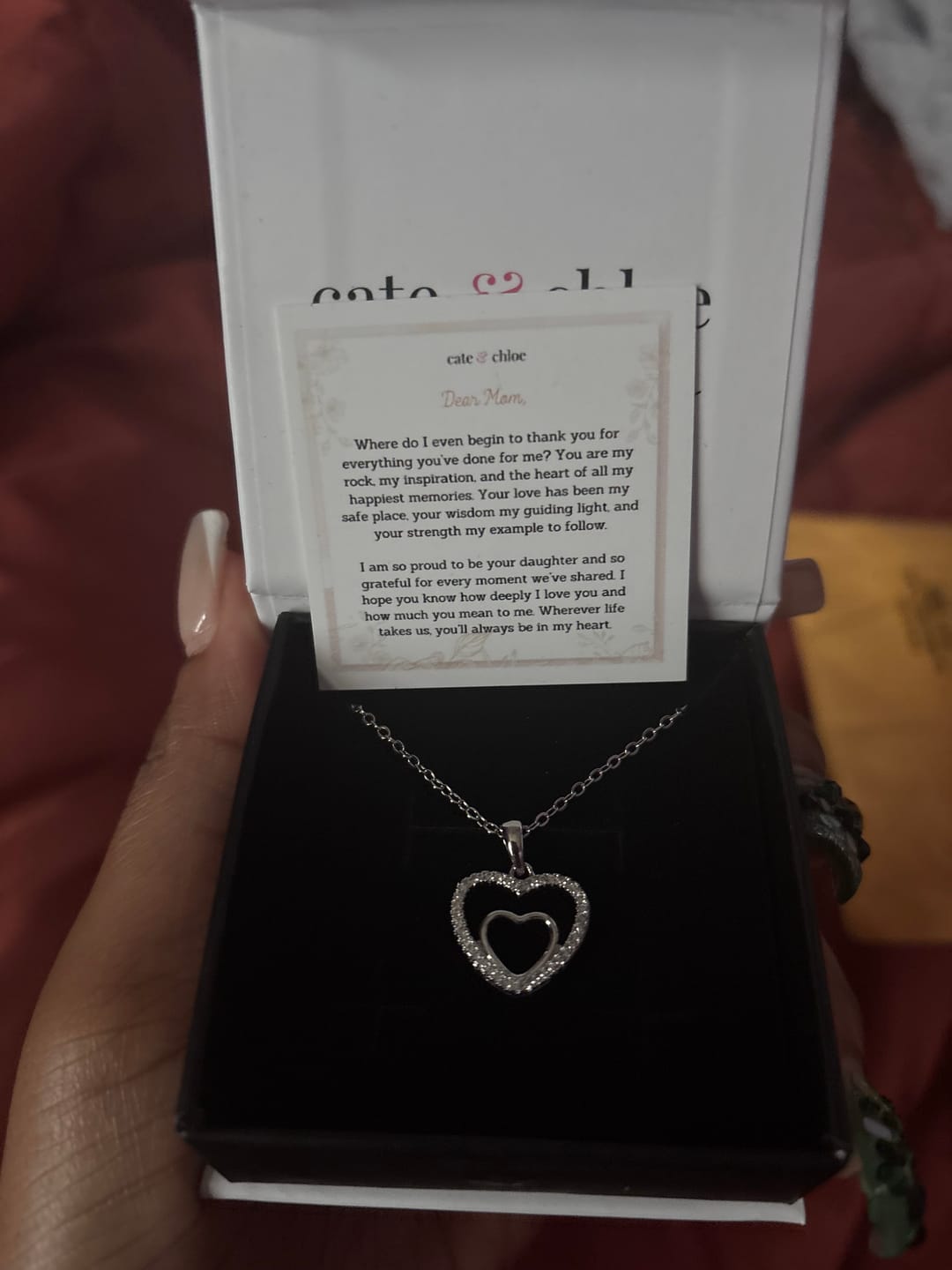 Customer photo review of Amorette 18k White Gold Plated Double Heart Pendant Necklace with Simulated Diamond Crystals & Heartfelt Message for Mom