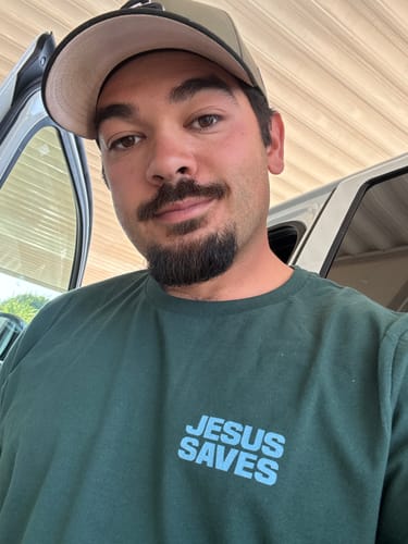 Customer photo review of Jesus Saves Shirt