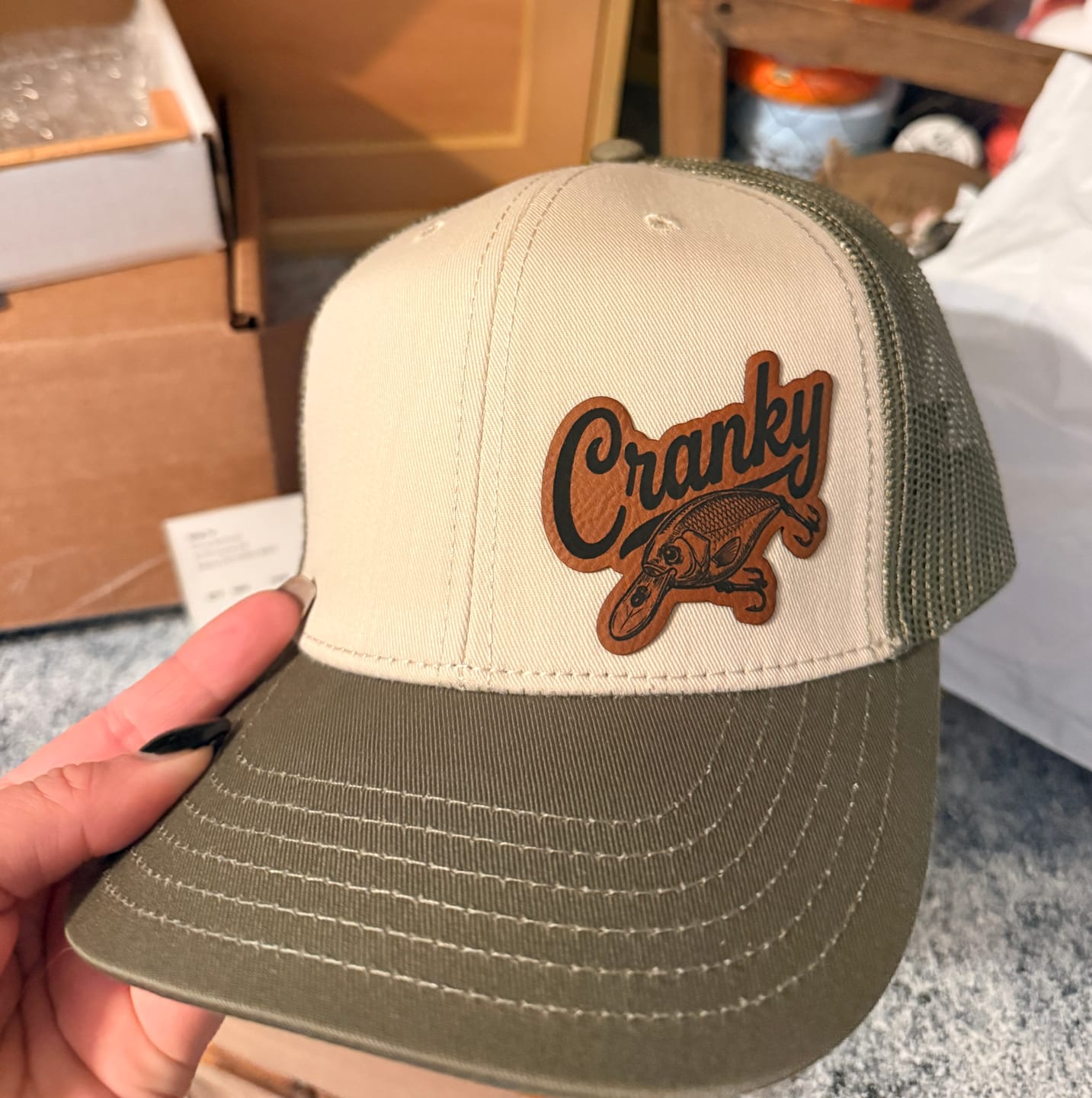 Customer photo review of Cranky, Crankbait Decal (left), Leather Patch Hat