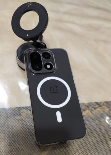 Customer's premium Anti Yellow Magsafe Clear Case on a OnePlus phone, attached magnetically to a black ring holder.