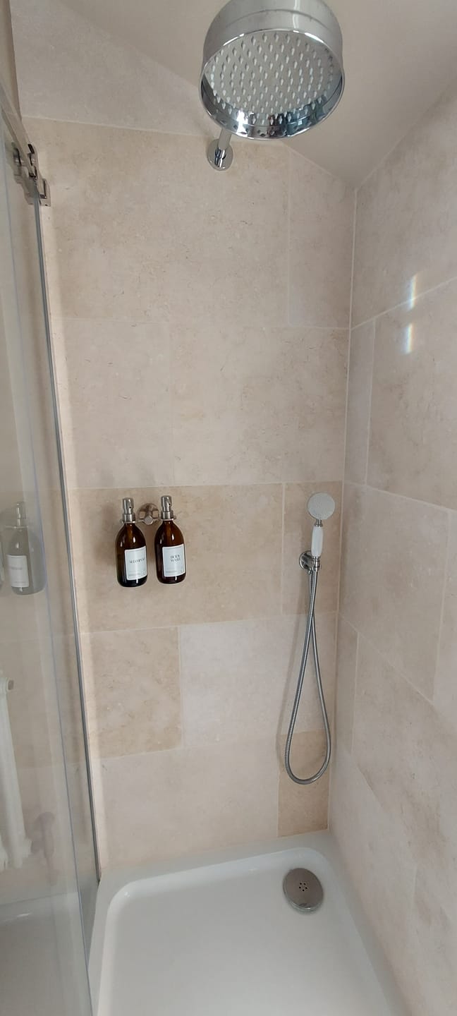 Customer photo review of 500ml Amber Glass Bottle with Metal Pump White Label