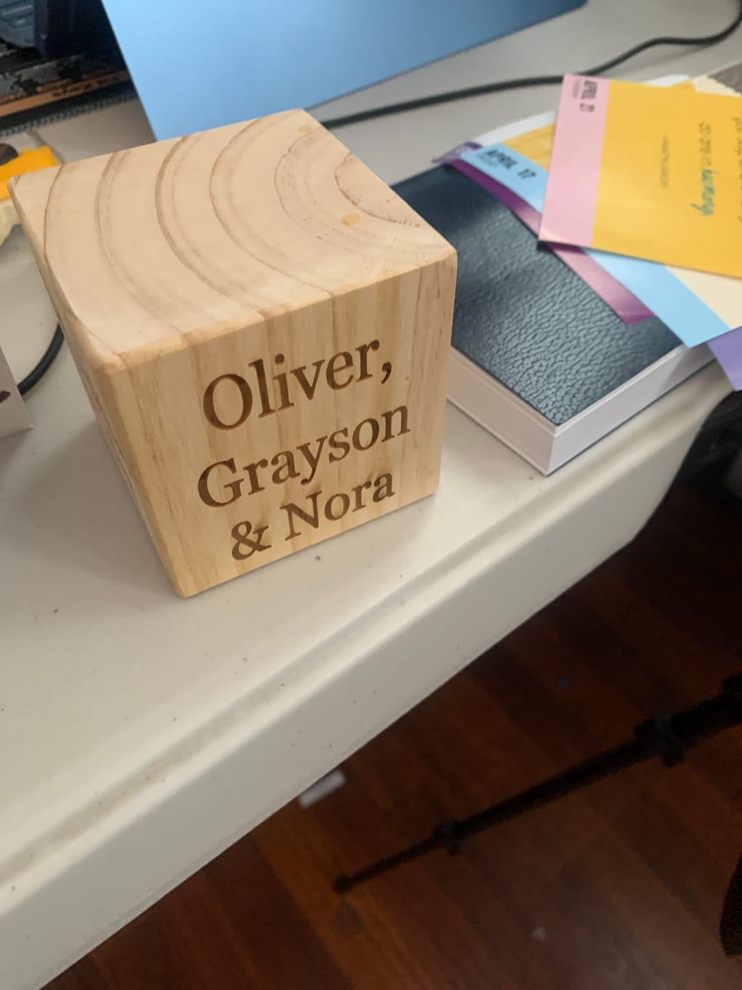 Customer photo review of Custom Engraved Wooden Desk Cube – Motivational Office Decor