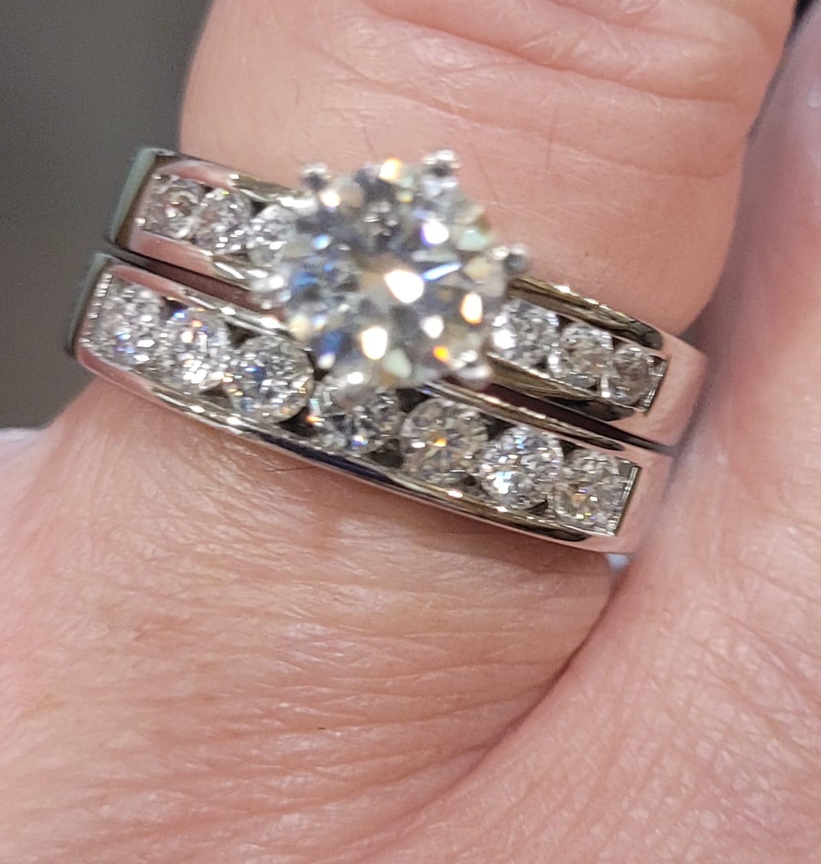 Customer photo review of Channel Set Moissanite Half Eternity Wedding Band Ring In Sterling Silver