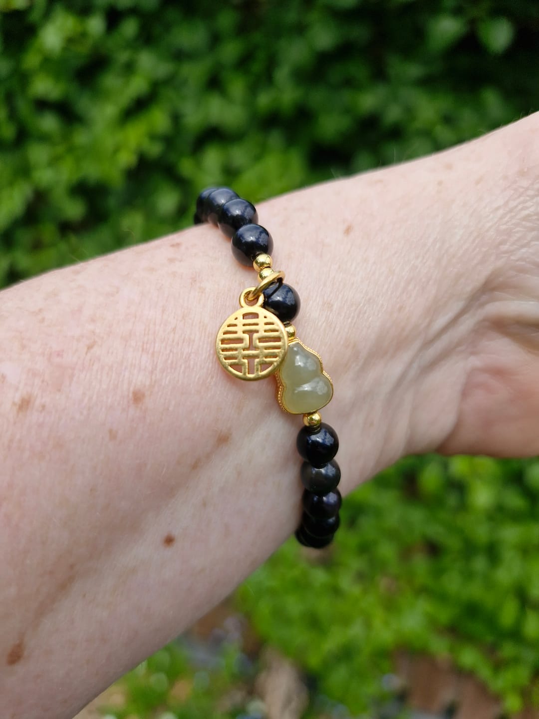 Customer photo review of Natural Black Obsidian Hetian Jade Gourd Double Happiness Strength Bracelet