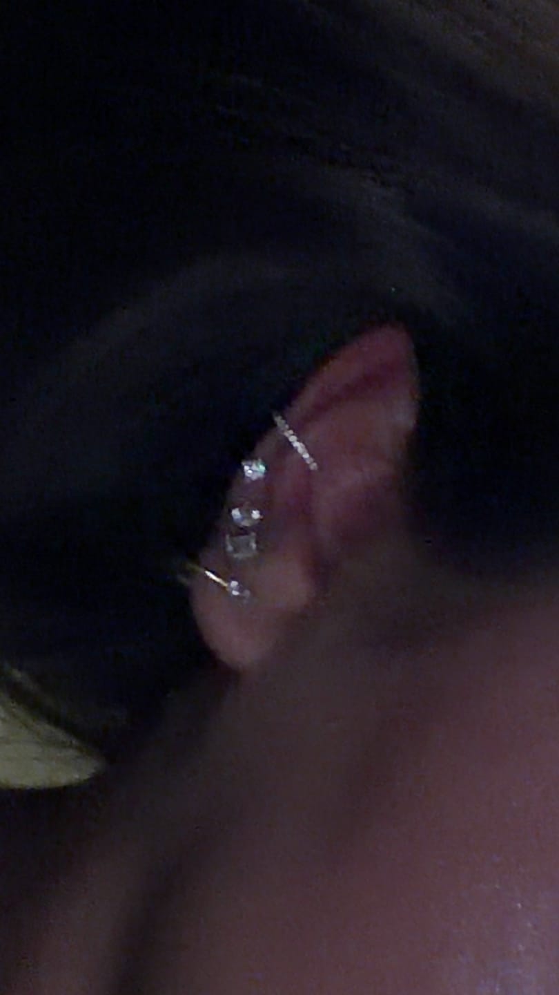 Customer photo review of Conch Clicker | Titan Piercing