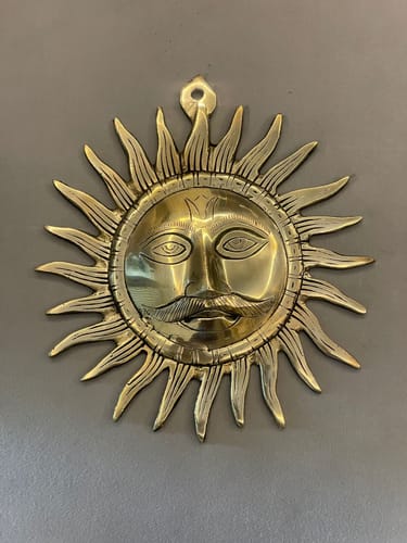 Customer photo review of Brass Surya (Sun) Ji Wall Hanging Idol Vastu Remedy for East Direction Balance, Fame and Positive Energy | 24 X 24 cm | 1 kg