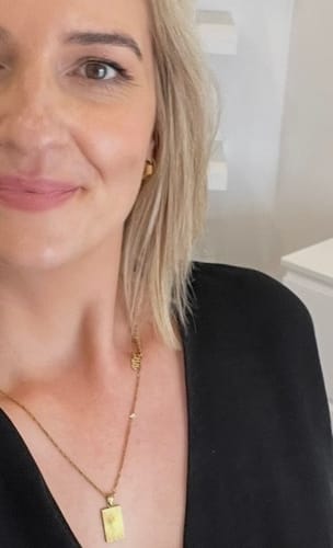 Customer photo review of Momentum Gold Huggie Earrings