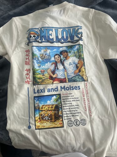 Customer's white ONE LOVE t-shirt with a custom graphic showing a couple in an anime style.