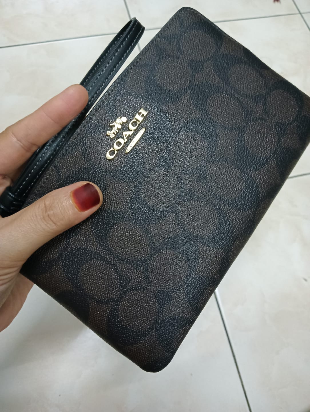 Customer photo review of Coach Large Corner Zip Wristlet In Brown Black CS438
