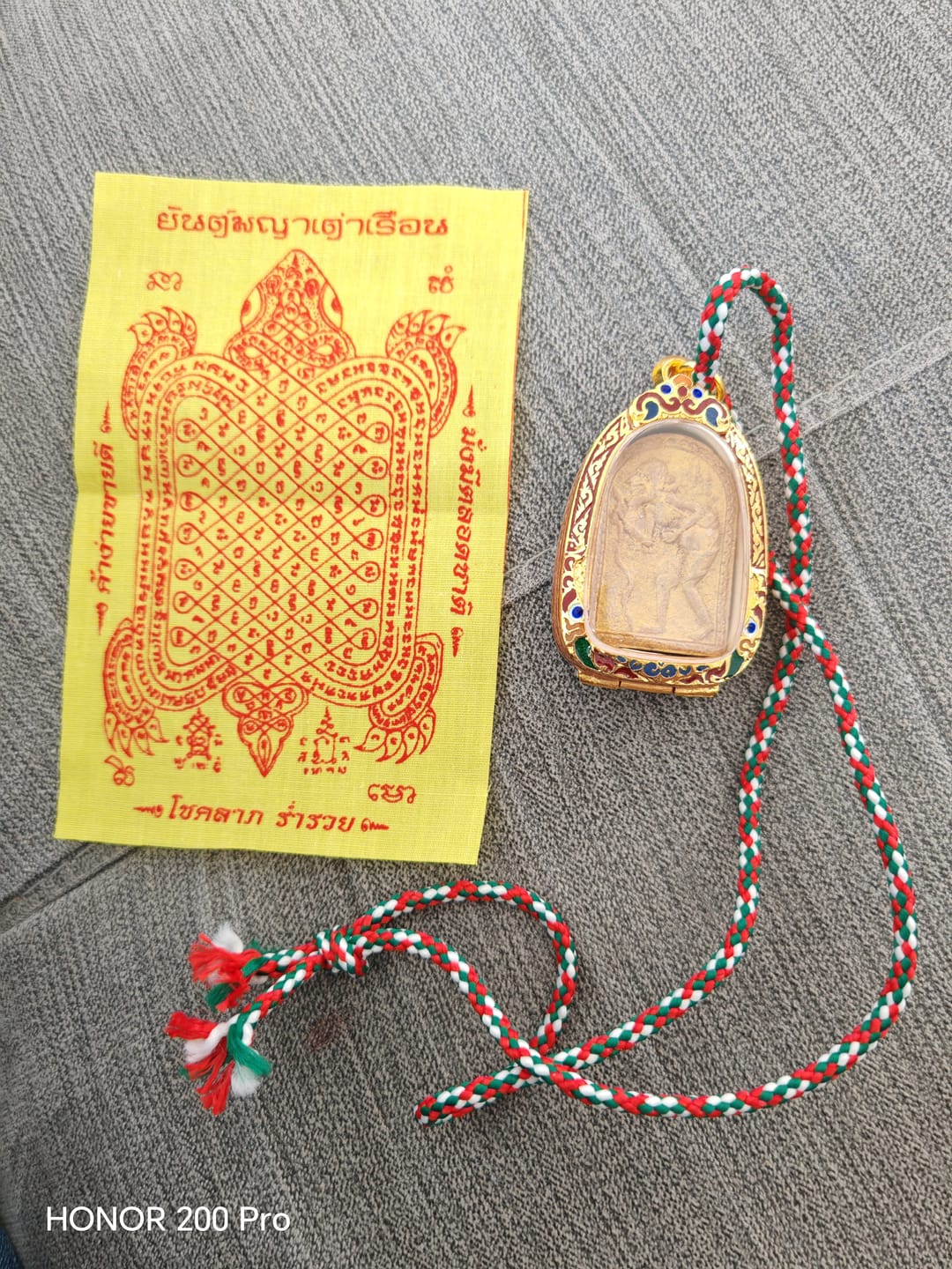 Customer photo review of Amulette de fortune Chuchok Praï Khuman - Très Vénérable Ajarn Sakorn. # 300