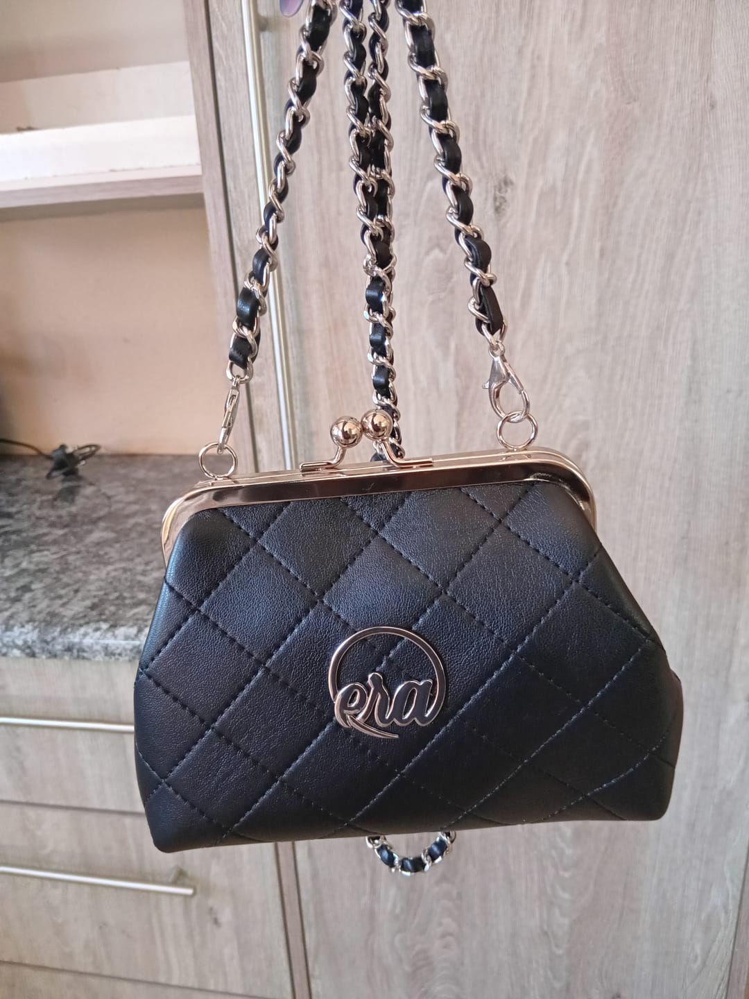 Customer photo review of ERA Mini Kisslock Chain Bag – Black