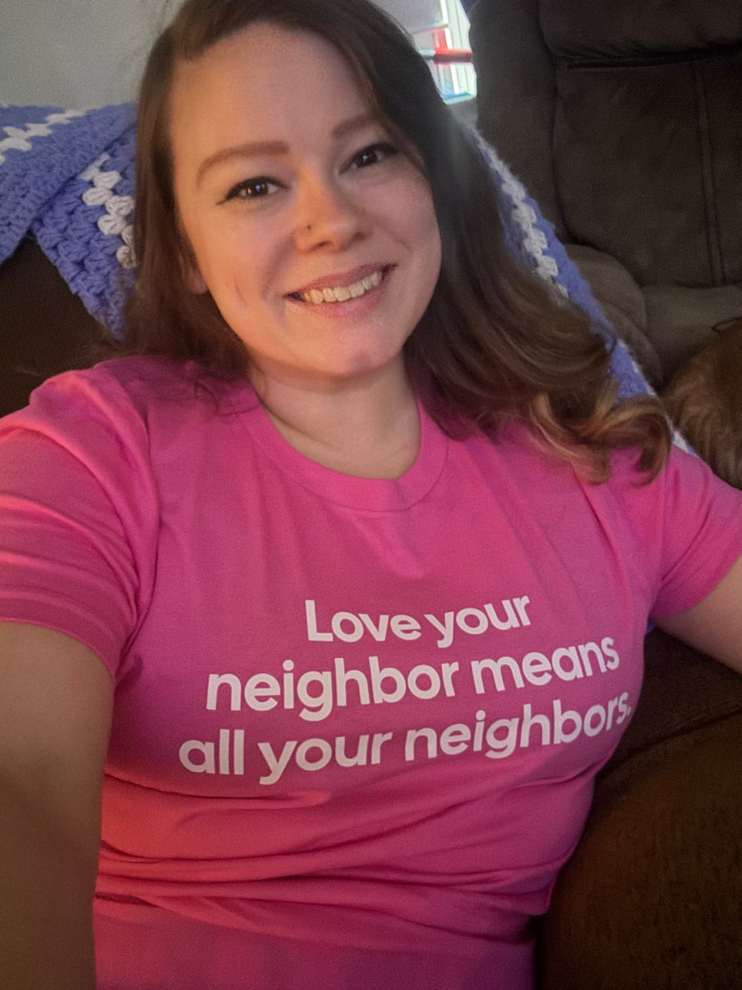 Customer photo review of Love Your Neighbor Means All Your Neighbors Unisex Tee