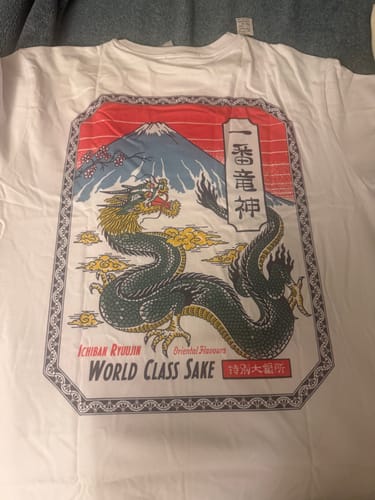 Customer's white Dragon Sake T-Shirt laid out flat, showing the detailed front graphic.