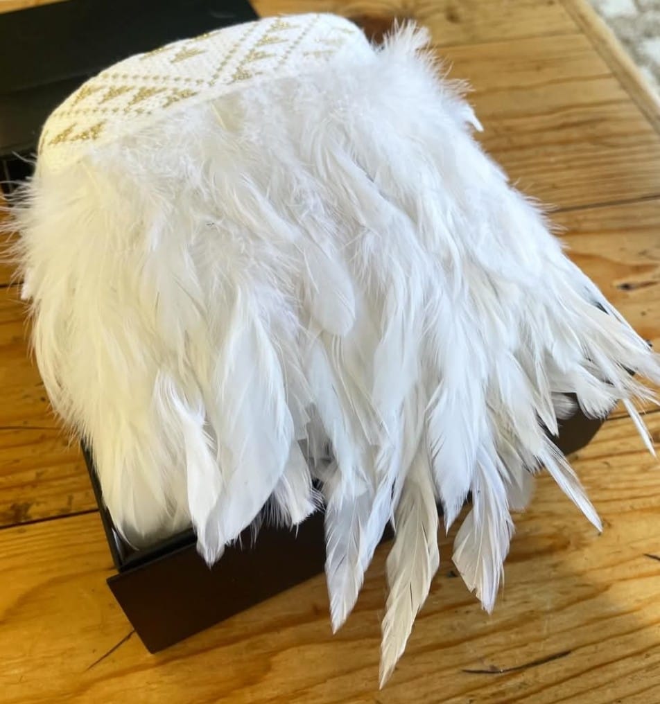 Customer photo review of Beautiful White Wedding Korowai Cape