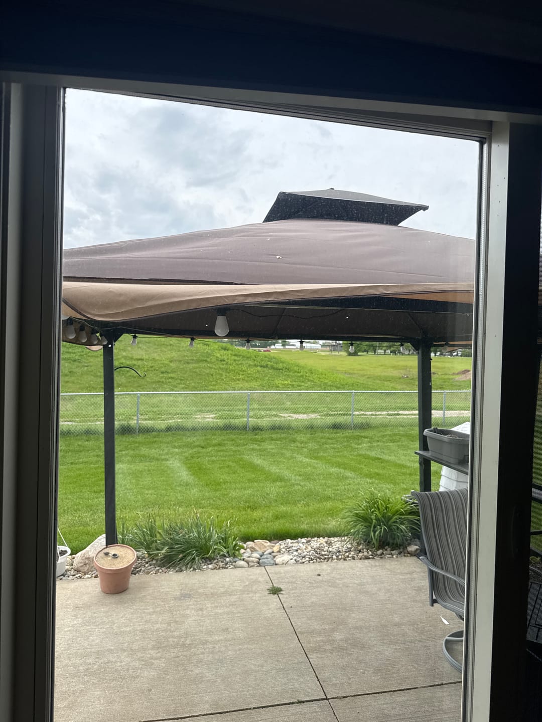 Customer photo review of Shade N' Shelters 10' x 10' Conley Gazebo w/ Awning & Bar - Main & Roof Vent Canopies