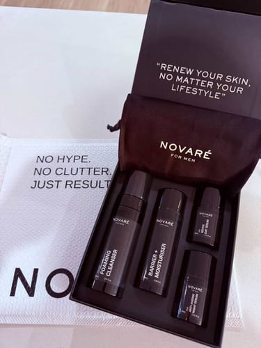 Reviewer's CORE FOUR HYDRATE BUNDLE in its black gift box, showing the cleanser, moisturiser, and two serum bottles.