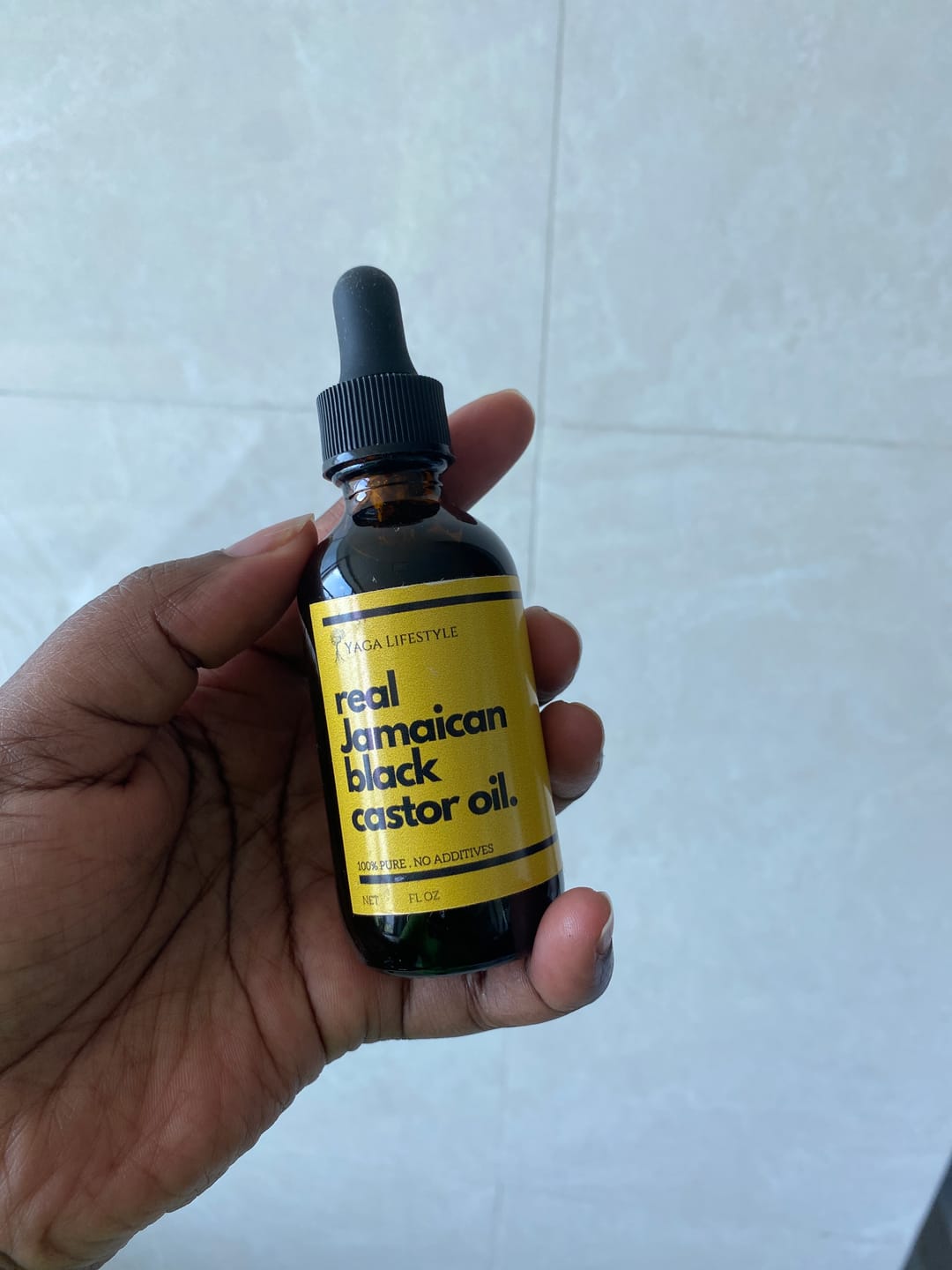Customer photo review of Raw Unrefined Jamaican Black Castor Oil