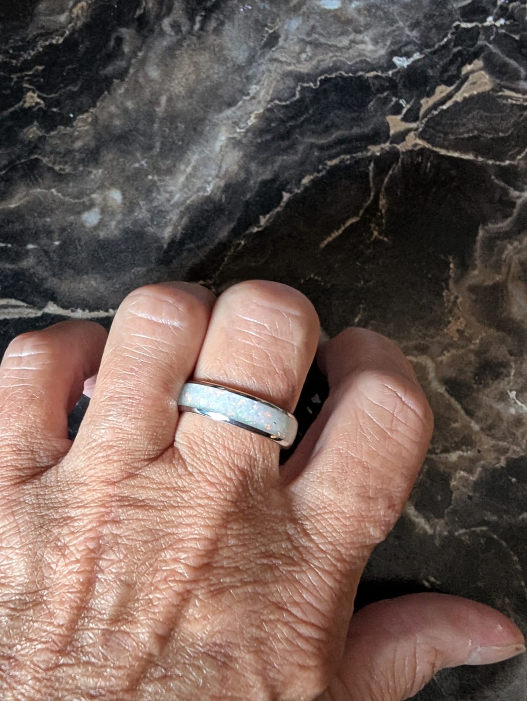 Customer photo review of The White Gold White Opal 6mm Wonder Ring