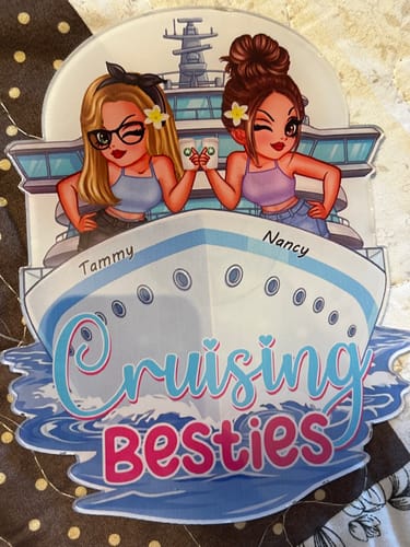 Customer's personalized cruise ship door magnet with illustrated women named Tammy and Nancy and 'Cruising Besties' text.