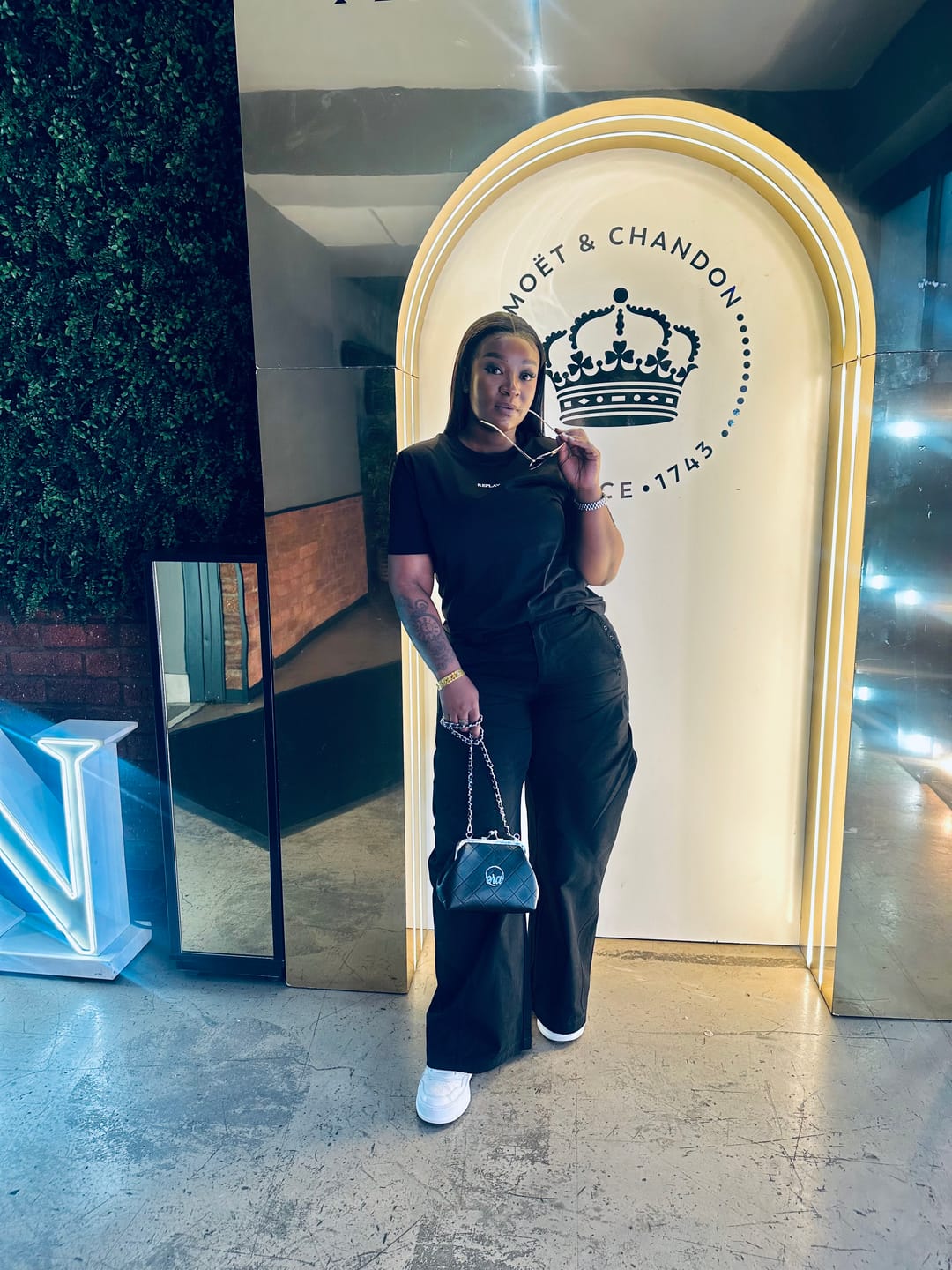 Customer photo review of ERA Mini Kisslock Chain Bag – Black