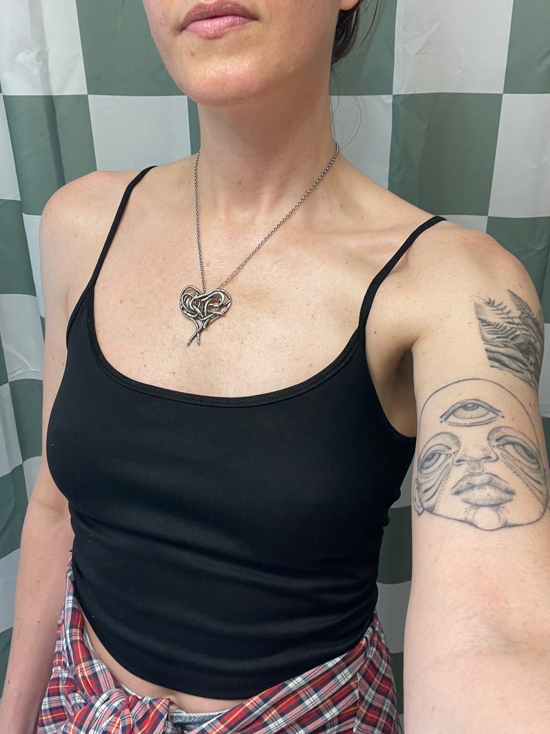 Customer photo review of Worm Heart Necklace