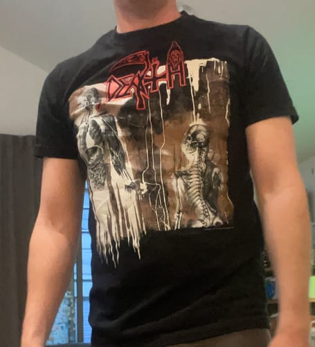 Customer wearing the black Death - Human shortsleeve shirt, showing the detailed front graphic.