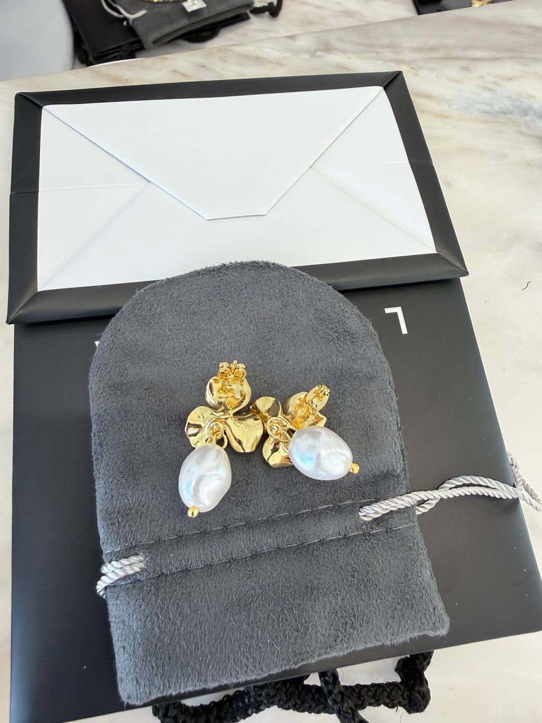 Customer photo review of Pulsera Plateada Bolitas Inicial Con Zirconias
