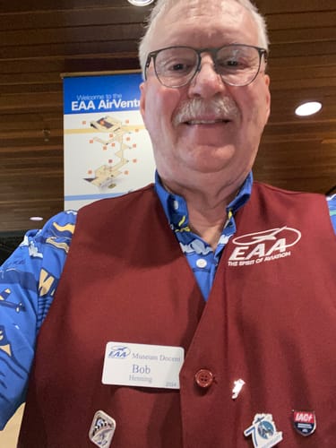 Customer showing their Artemis II - Collectors Pin displayed on a red museum vest.