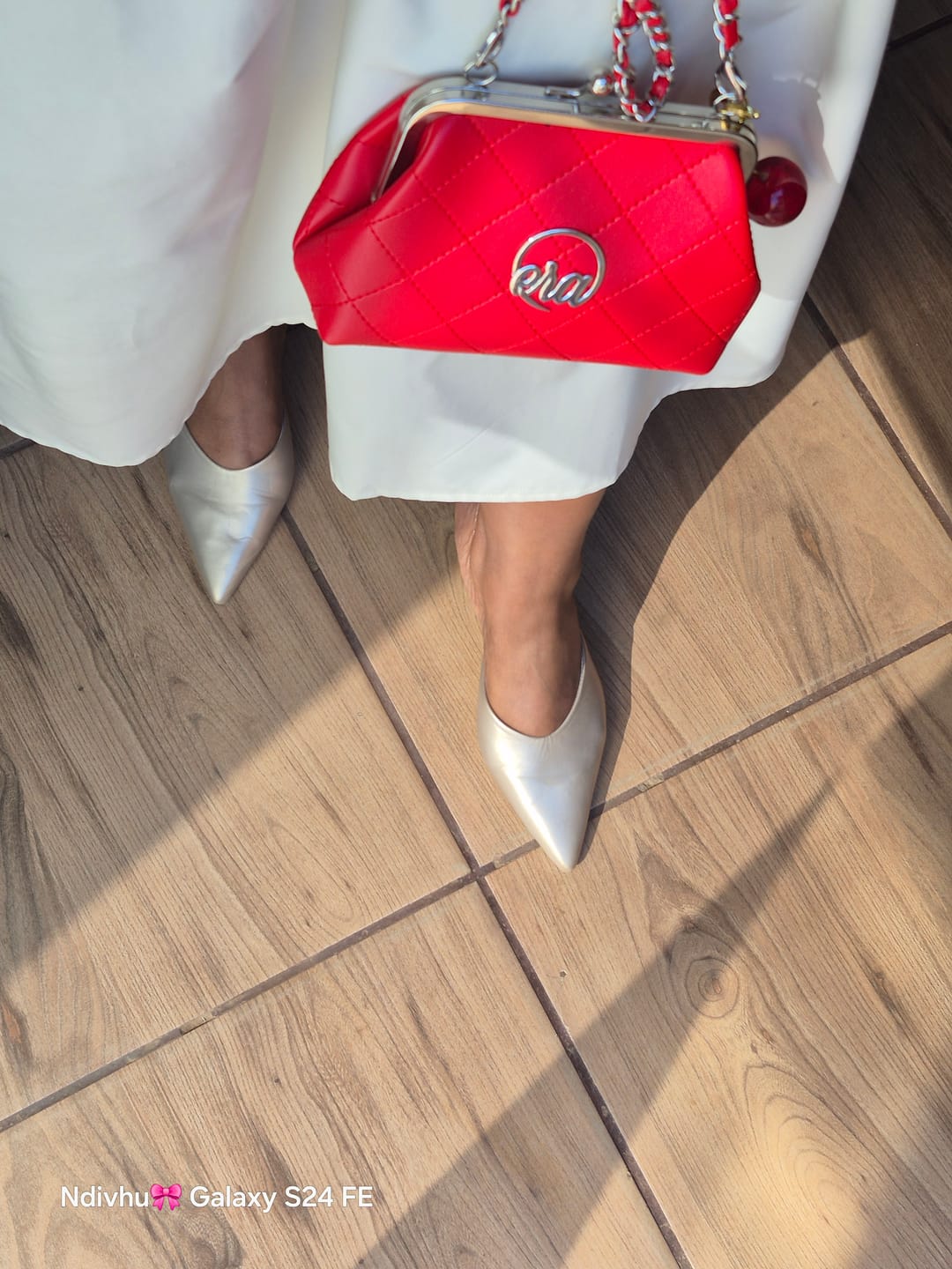 Customer photo review of ERA Mini Kisslock Chain Bag – Red