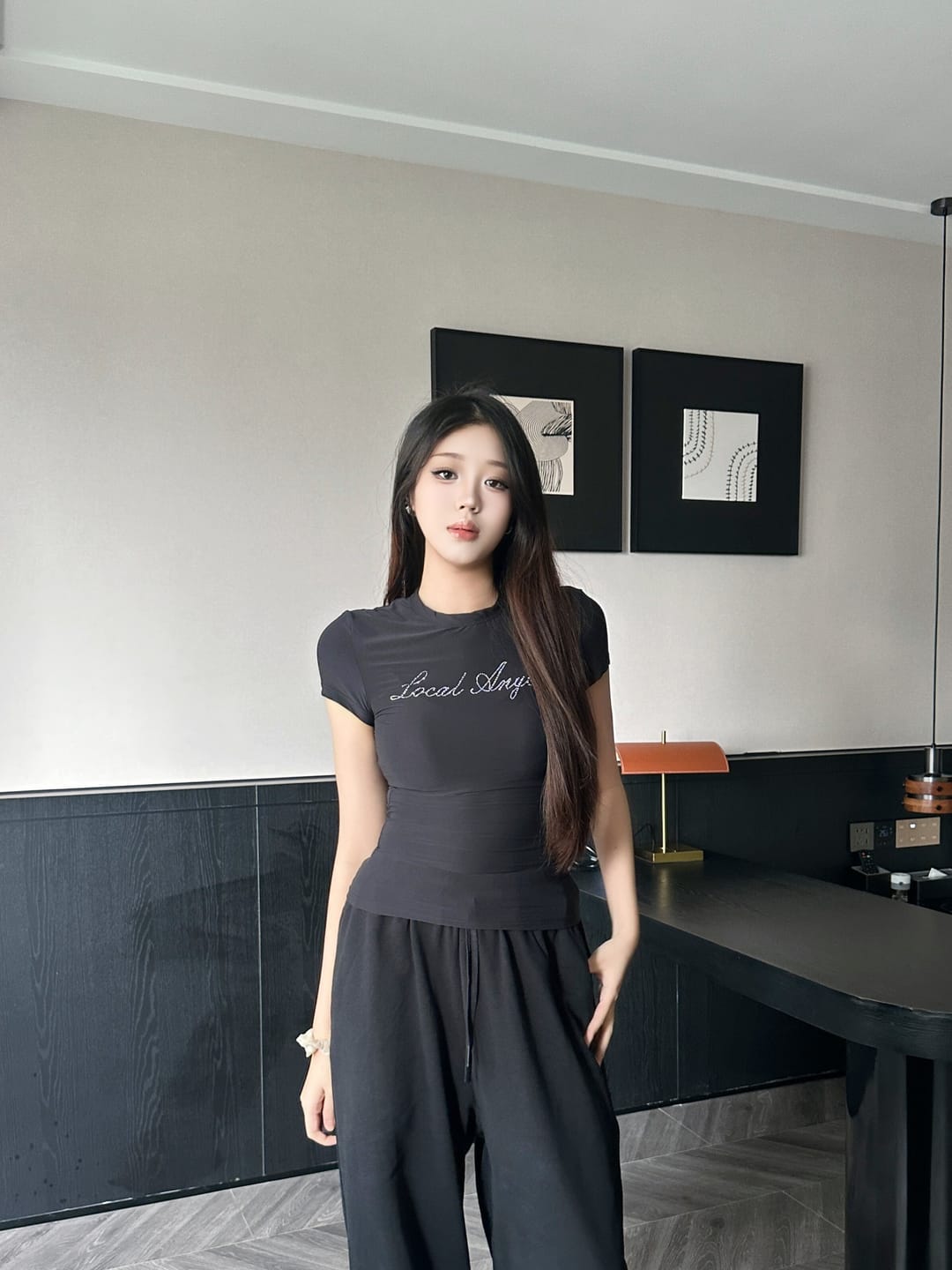 Customer photo review of ROVENTE Black Fitted Baby Tee in Stretch Cotton