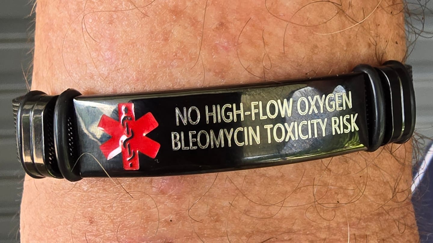 Customer photo review of Personalised Black Mesh Medical Alert Bracelet - Red Logo