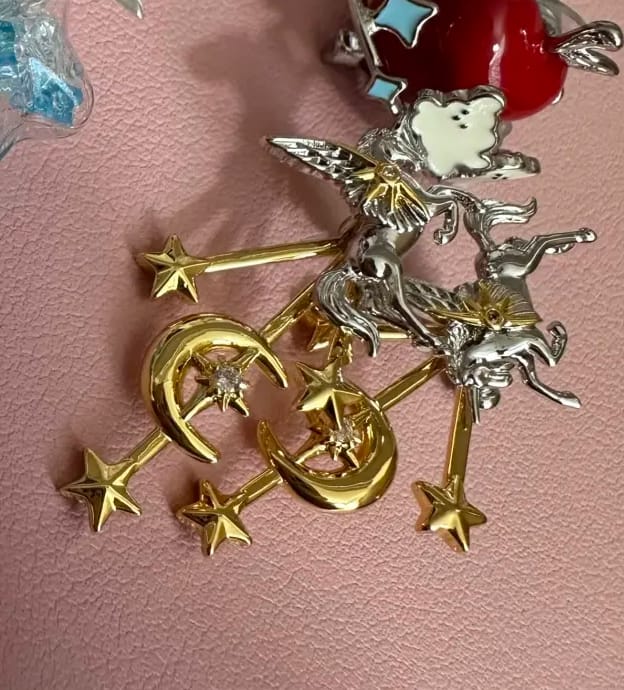 Customer photo review of "DREAM HORSE" 18K Gold Plated Detachable Unicorn Moon & Star Statement Drop Earrings