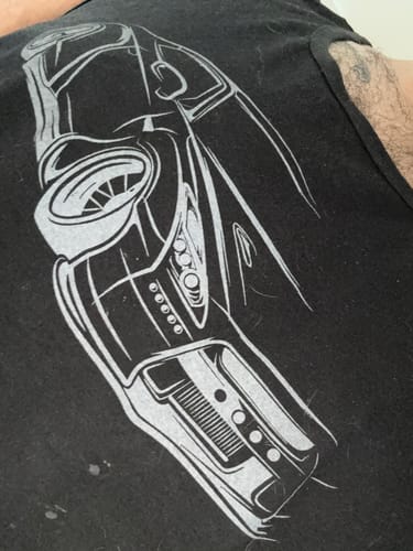 Customer's close-up of the black 80Eighty® DCG88 Shirt, focusing on the white car graphic.
