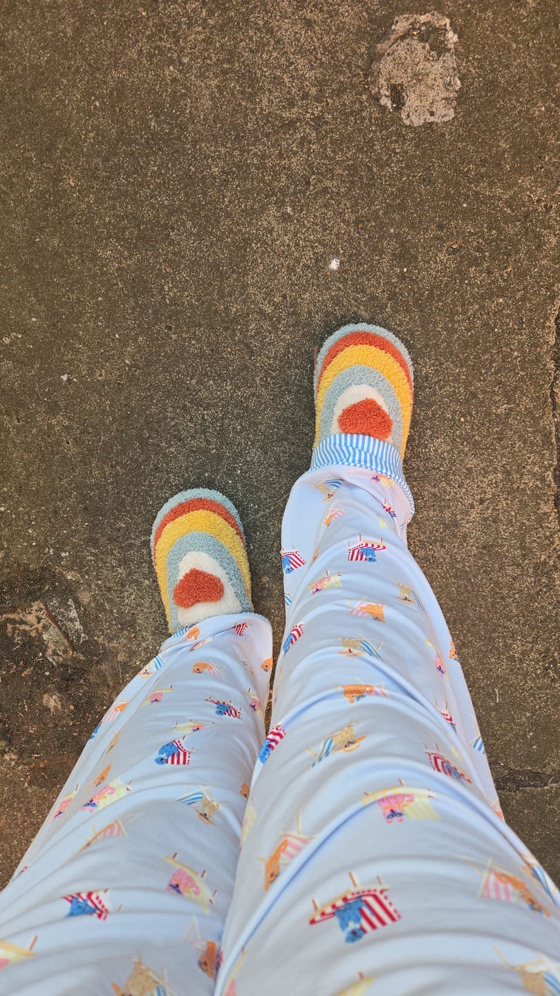 Customer photo review of Plush Rainbow Heart Slippers