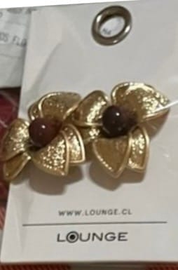 Reseña con foto de un cliente sobre Aros Flor Centro Resina