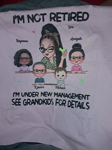 Customer's personalized 'I'm Not Retired' shirt featuring custom avatars of a grandma and four grandkids with their names.