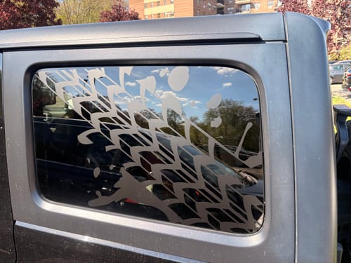 Customer photo review of Tire Tread Rear window Graphic (4 door) ( Both Sides)