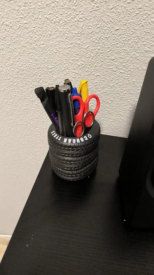 Customer photo review of 1pcs Fun Tire-Shaped Pen Holder -PVC Desk Organizer,