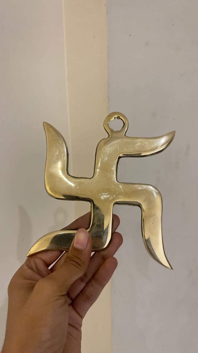 Customer photo review of Brass Swastik – Vastu Remedy for Home Protection | Main Door Dosh Nivaran | 6 & 9 Inch