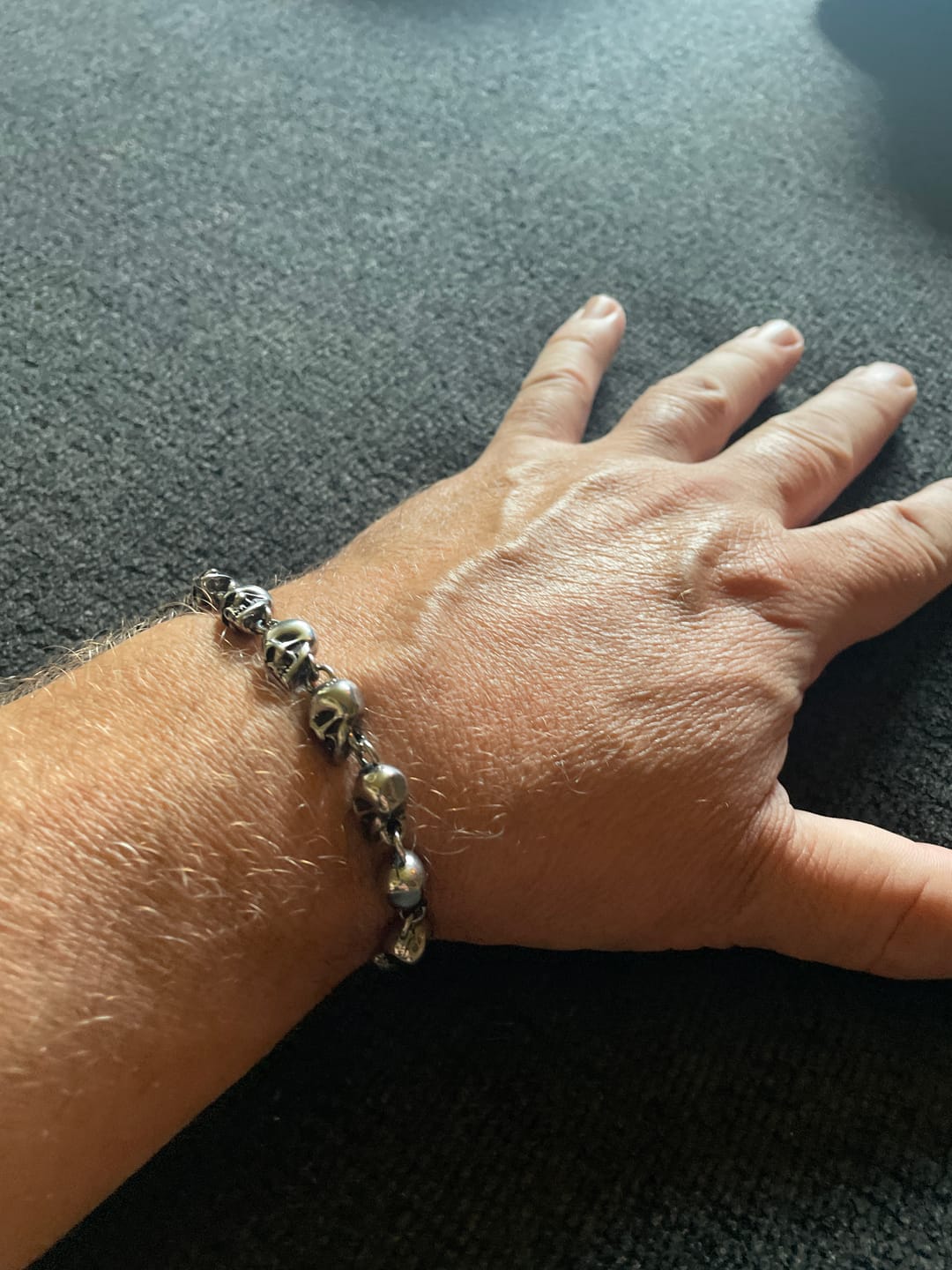 Customer photo review of Skulls Of The Fallen - Stainless Steel Skull Bracelet