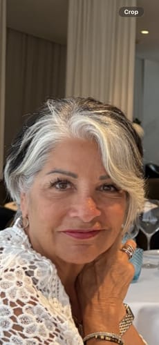 Reviewer's face showing smooth, healthy skin after using the Micro Infusion System.