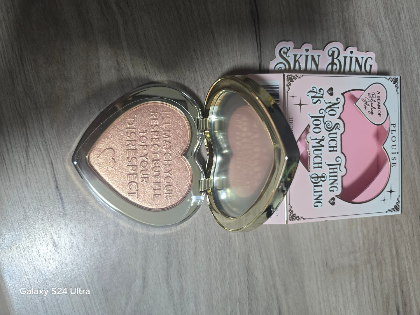 Customer photo review of Skin Bling Baked Highlighter Powder