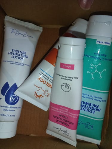 Customer's 24 Hour Glow Pack products, including lotion and creams, displayed inside a cardboard box.