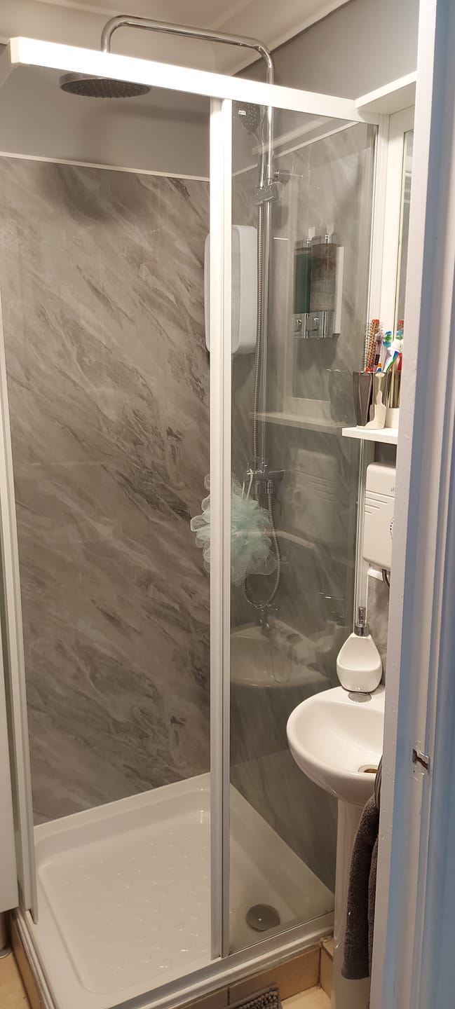 Customer photo review of Premium Grey Stone Marble Gloss Shower Wall Panel - 1M x 2.4M