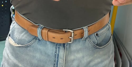 Customer wearing the brown, thick Premier Double Layer belt with jeans.