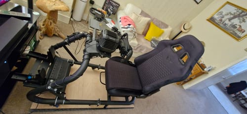 Reviewer's XL RS Simulator Seat V2 installed on a complete racing simulator rig.